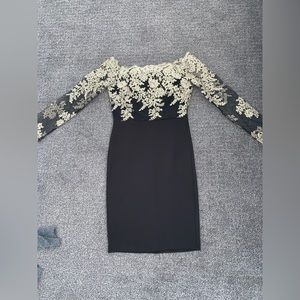 Black and pressed gold lace dress